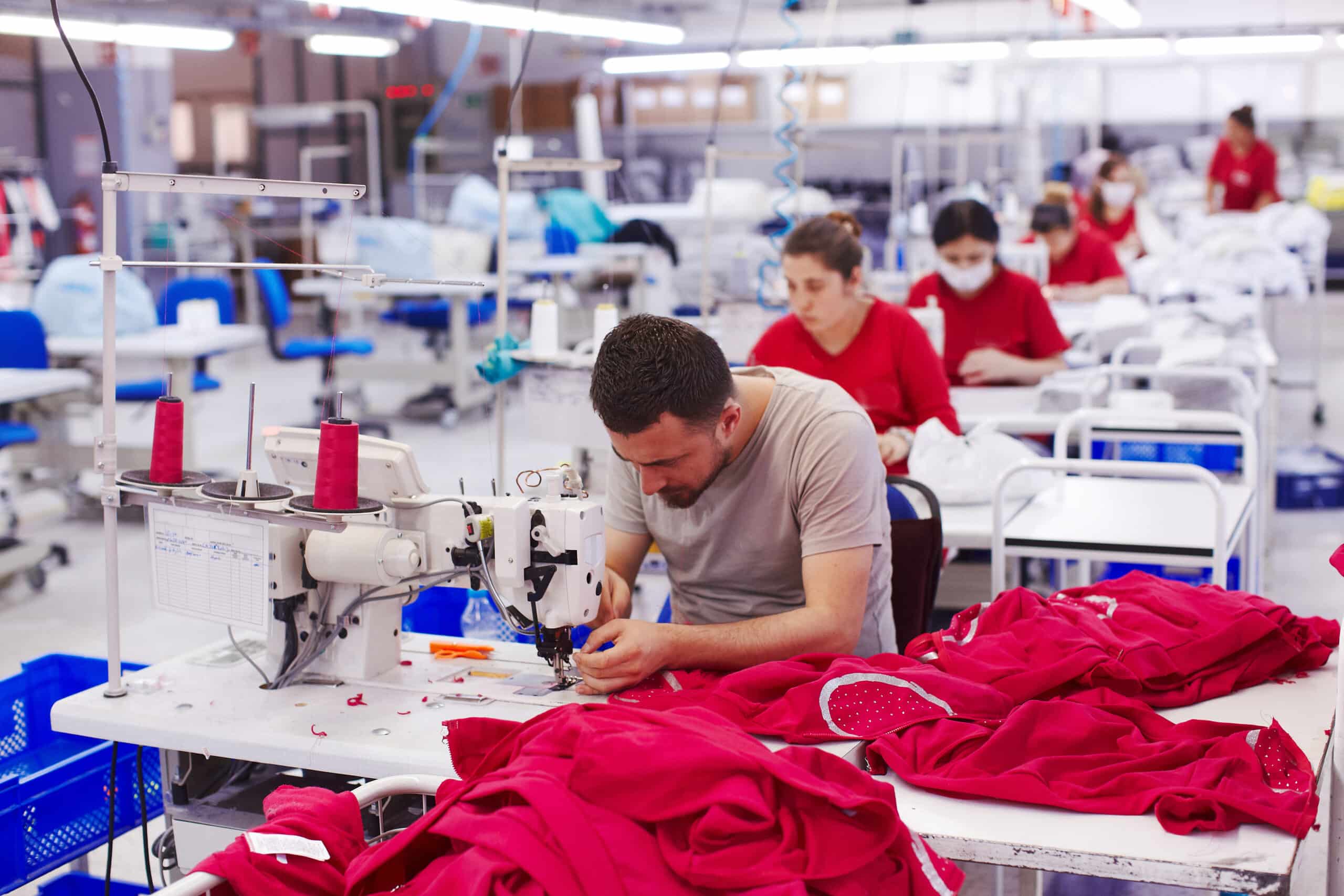 Factory workers sewing