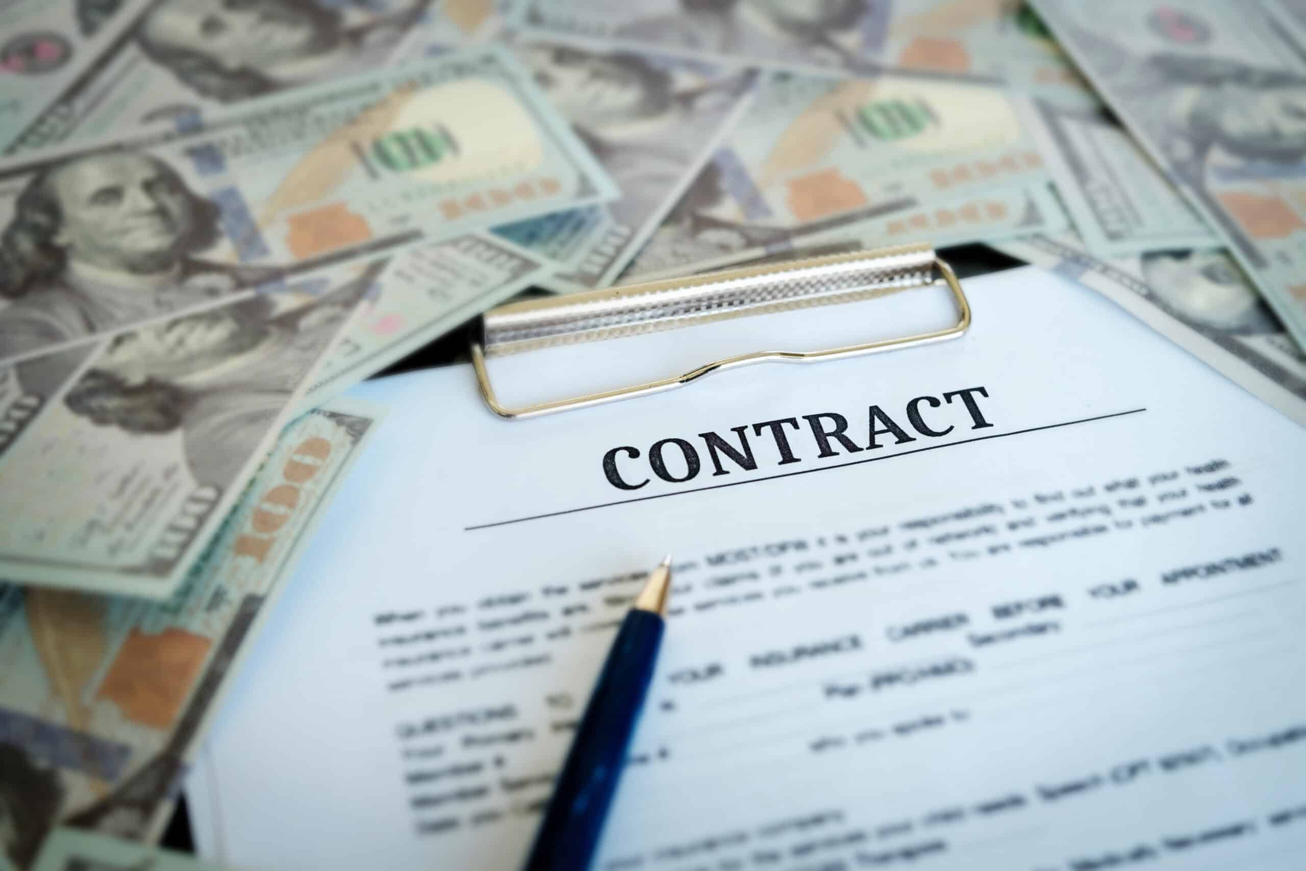 contract surrounded by money