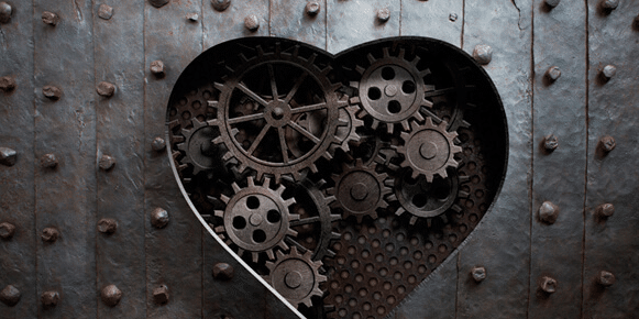 metal heart with metal cogs inside