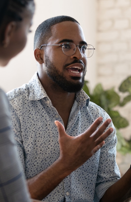 man in the middle of a passionate discussion