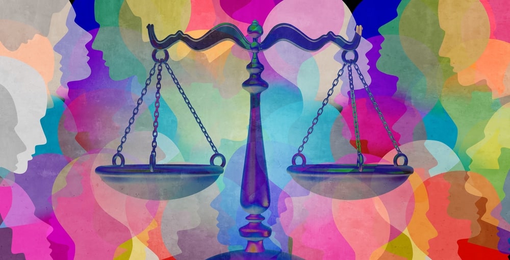 graphic of scales of justice with lots of colourful faces in the background