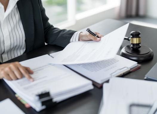 Woman looking through legal documents