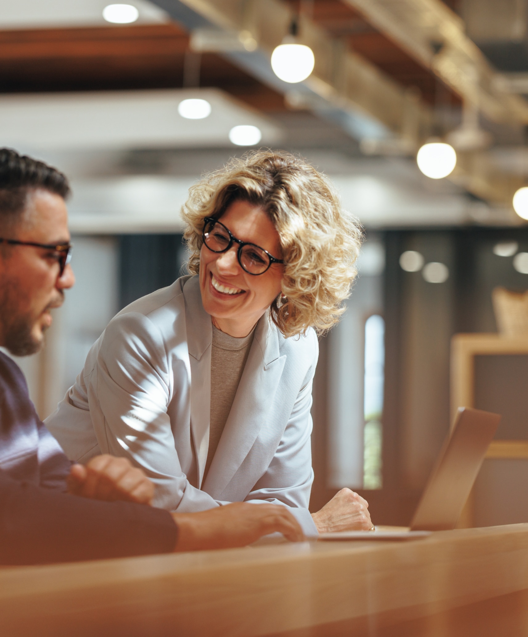 Woman providing ABC training to her male colleague