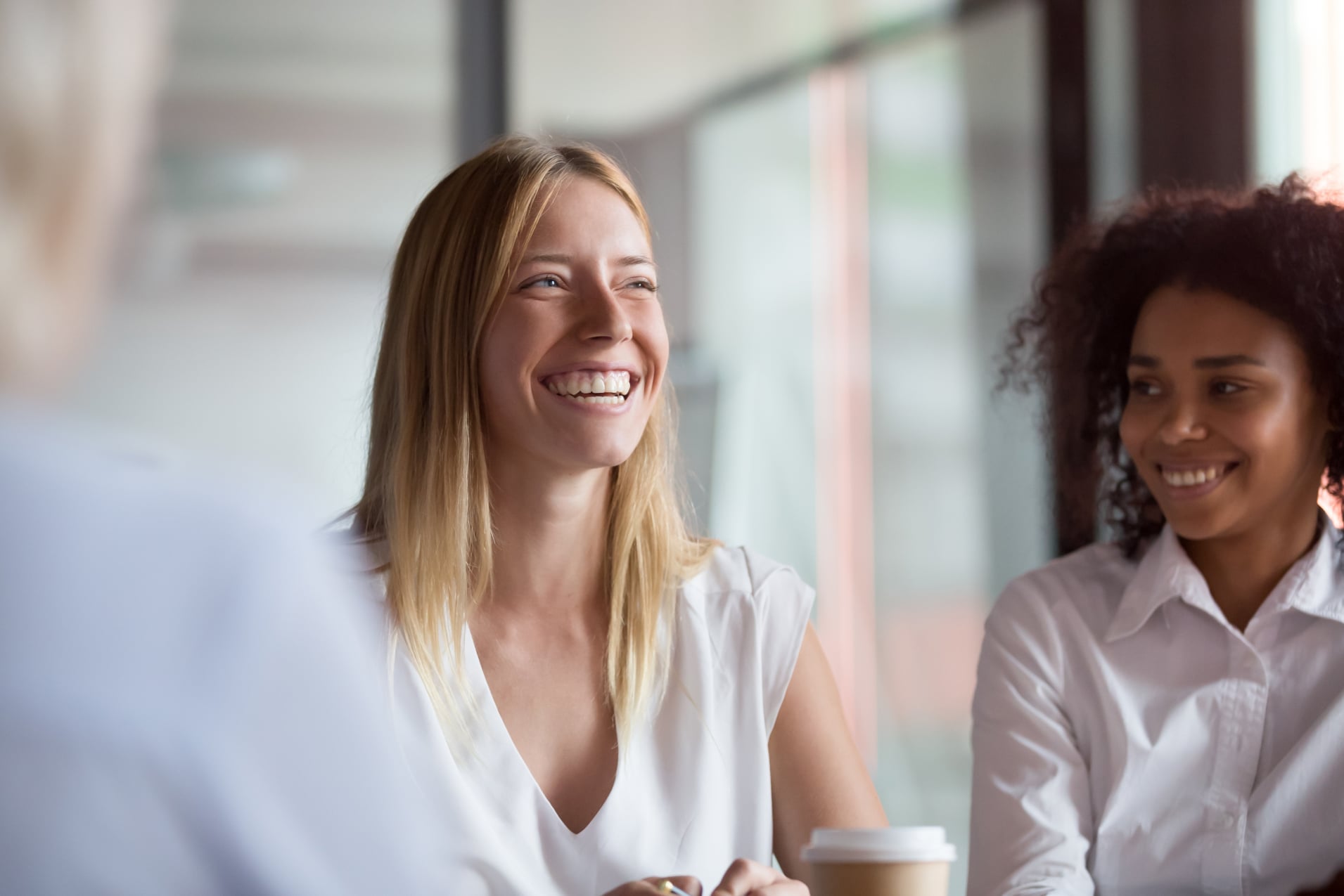 Woman smiling with her colleague