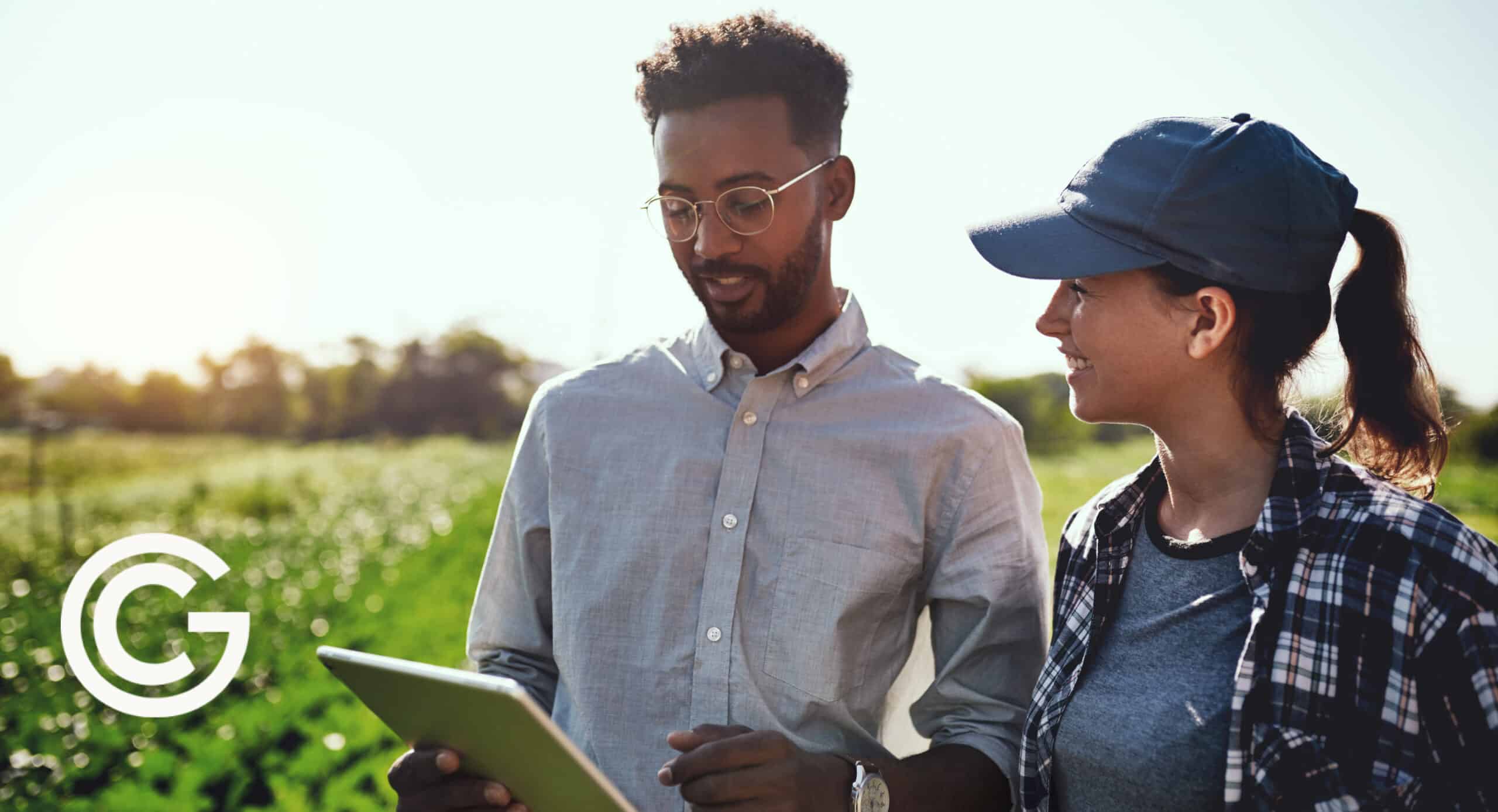 Man talking to a stakeholder in a field