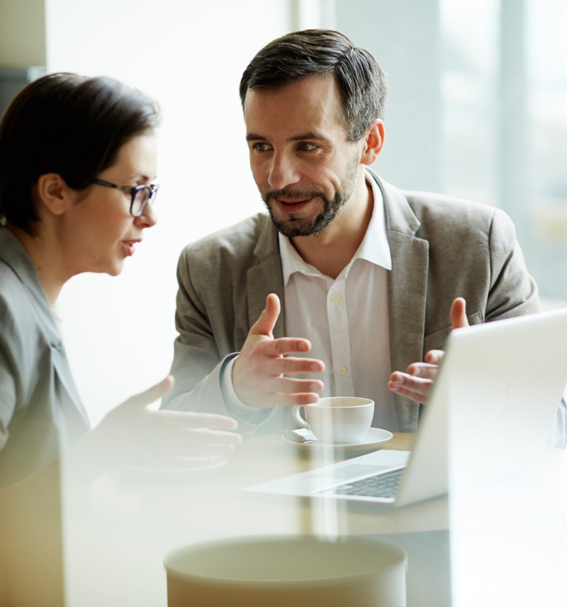 Two people discussing a project