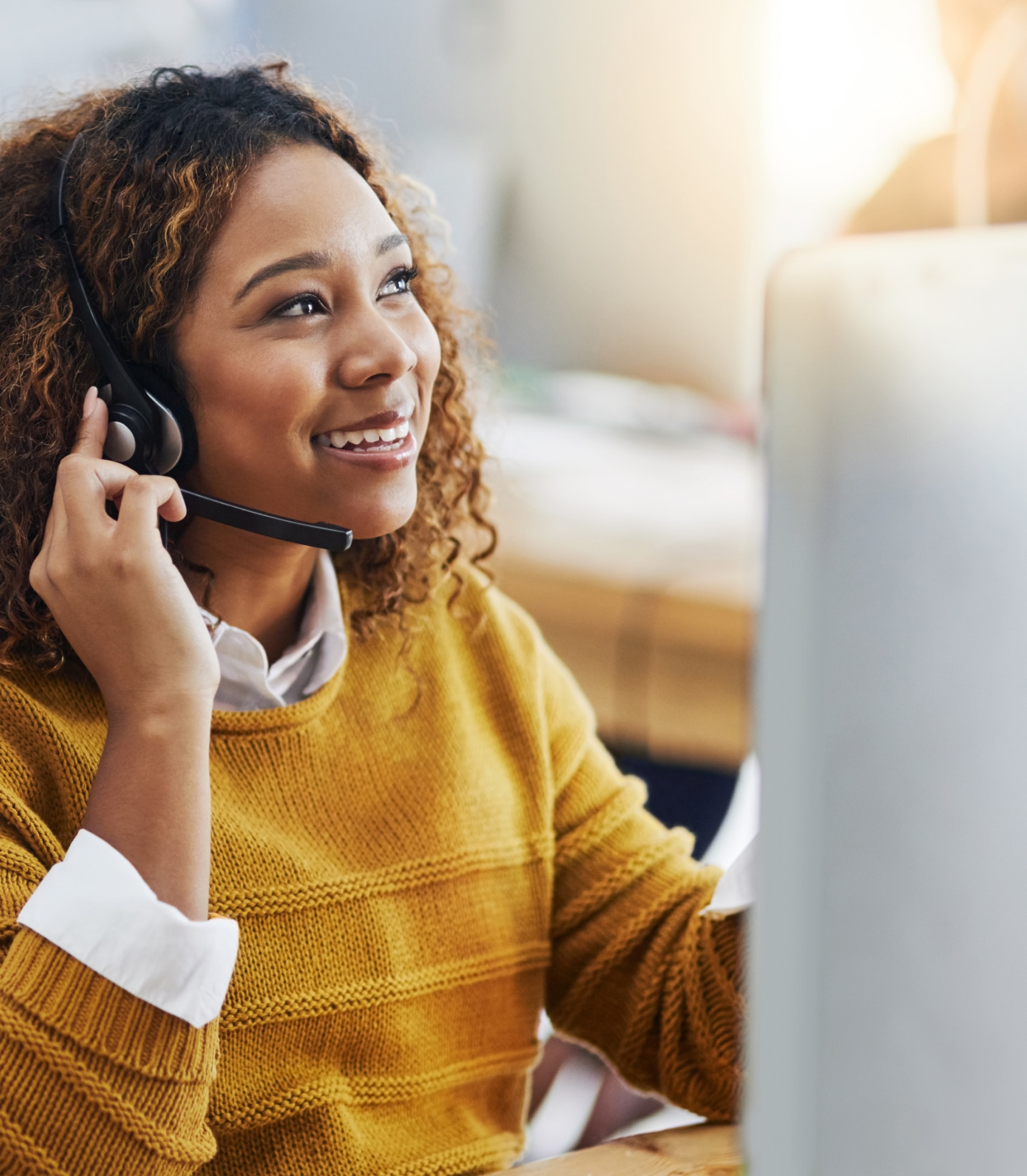 Woman using a headset talking on the phone